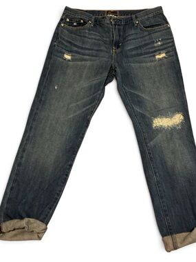 Levi's Women’s Boyfriend Jeans — Faded Blue with Distressed Details